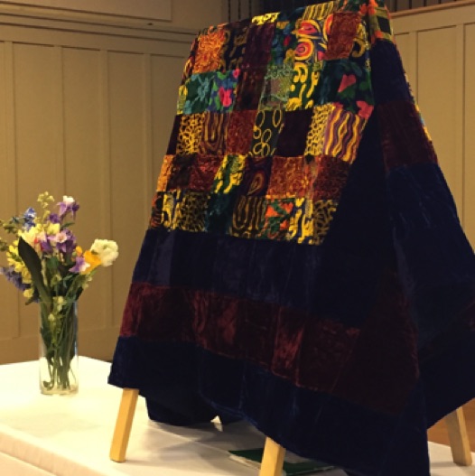 This coverlet was displayed in anticipation of the auction at the Spring Scholarship Tea.